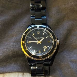 Authentic Michael Kors ceramic watch in black and gold
